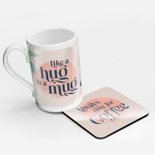 A printed mug and coaster with a pink design