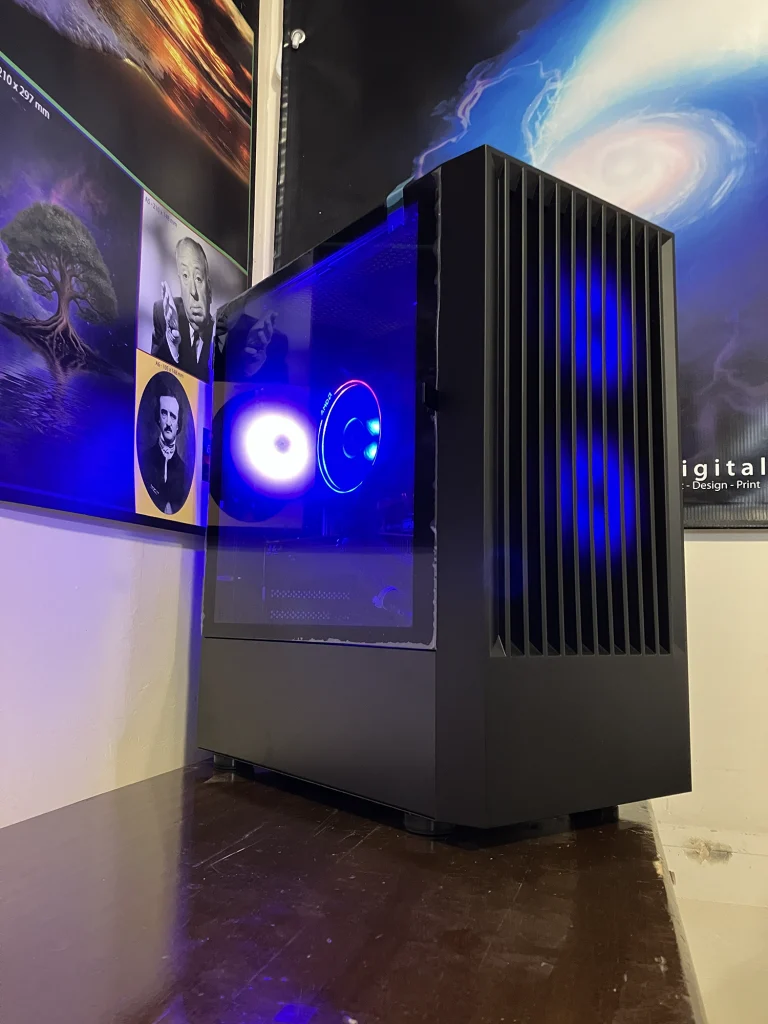 High-performance Ych Brych custom-built PC at Bluesdigital in Newtown; a professional-grade desktop featuring a high-spec graphics card and i7 CPU, showcasing our signature "Repair & Reuse" expert computer assembly.