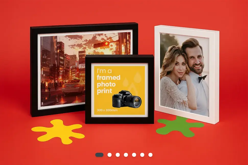 Three framed photos, one white frame, two black in different sizes, set against a red background.