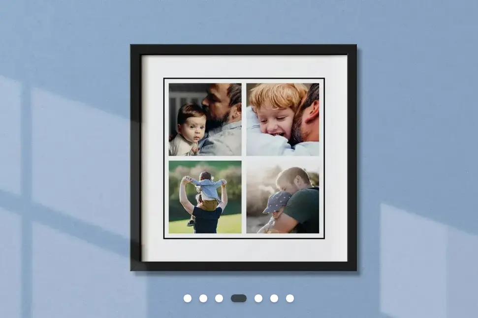 A set of four photos of a father and son. Printed and displayed in a black picture frame. Hanging on a blue painted wall with the shadow of the window frame where the sun is shining through onto the photo print.