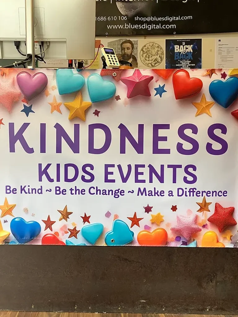 A photo of a banner printed by Bluesdigital, hanging on the front desk.