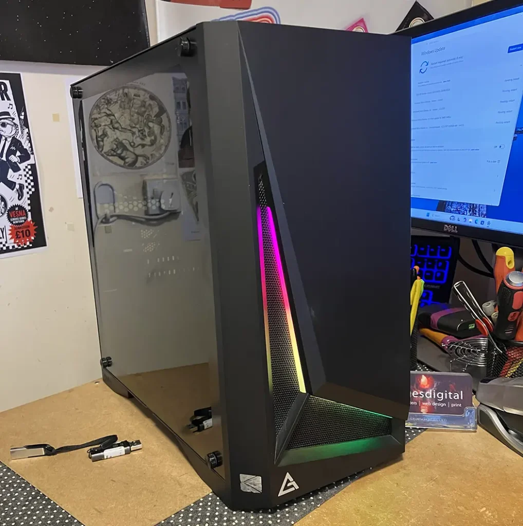 an external view of a recycled glass panelled PC Case with RGB lighting used for a refurbished workstation build.